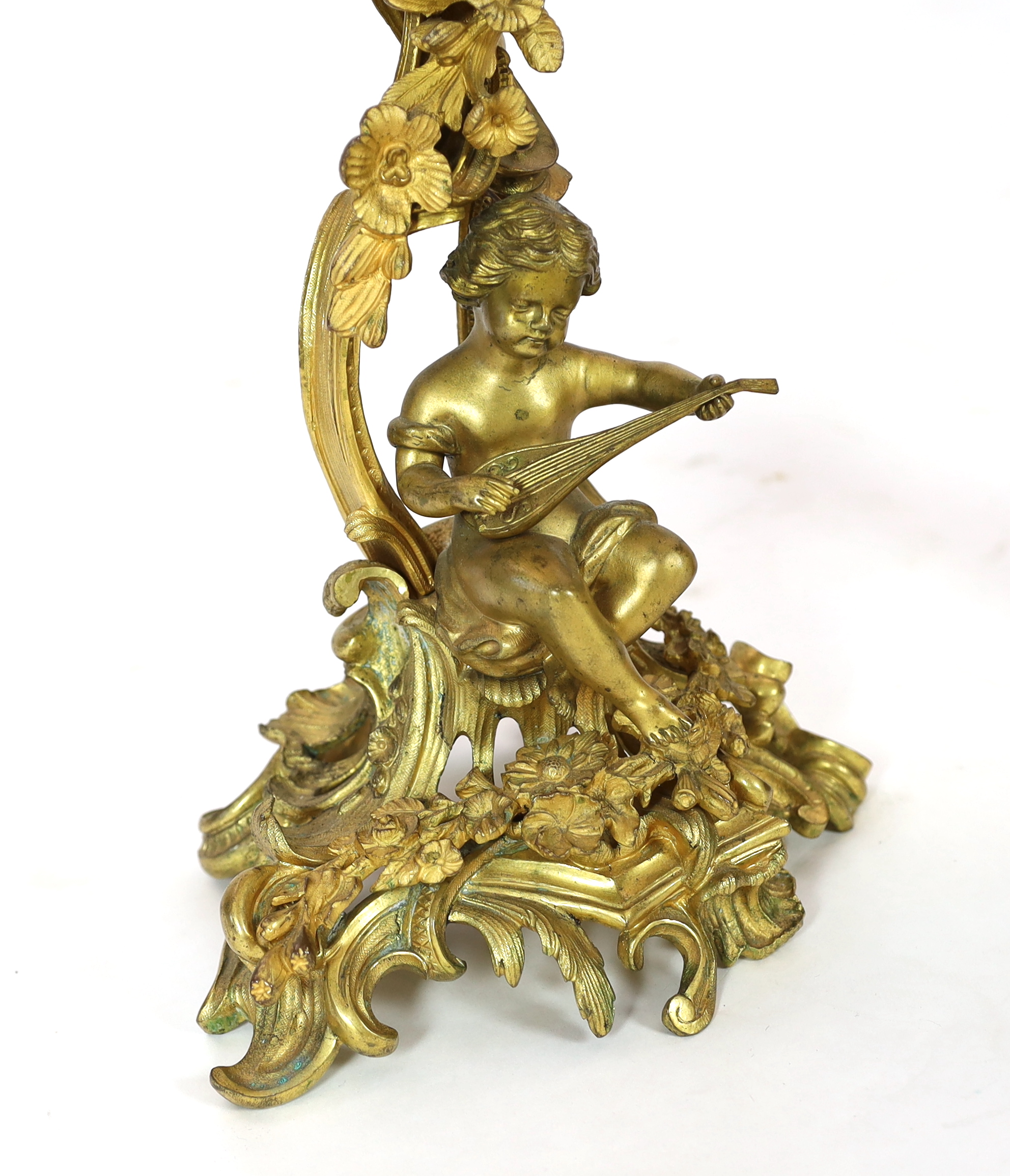 A pair of late 19th century French Louis XVI style ormolu seven light candelabra, 74cm high